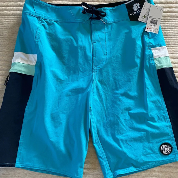 Volcom Boys Board Shorts Swim Suit Pockets Solid Blue size 20 NEW - Picture 1 of 10